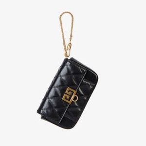 Women’s Givenchy Mini Pocket Bag Quilted.